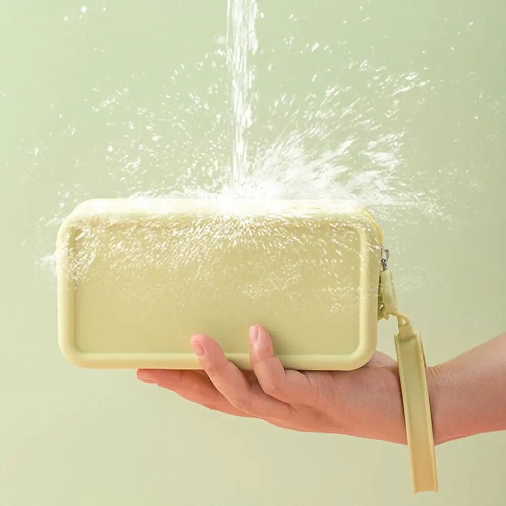 Neue Silikon-Münzbörse Große Kapazität Wasserdichte Reise-Tasche Reißverschluss Einfarbige Schreibwaren-Tasche Damen Mädchen