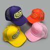 Baseballové kšiltovky Color Block s špinavými písmeny Nové Unisex Sluneční clona Color Block Prodyšné Osobní Všestranné Síťované Módní Trucker kšiltovky