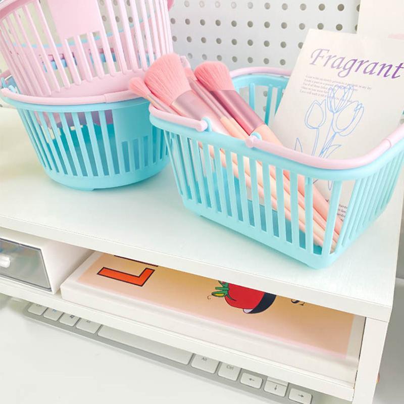 Neuer Kunststoffkorb-Organizer Tragbare Einkaufs-Aufbewahrungsbox Desktop-Kleinteile Spielzeug Obst Schreibwaren-Organizer Heimaufbewahrungskörbe