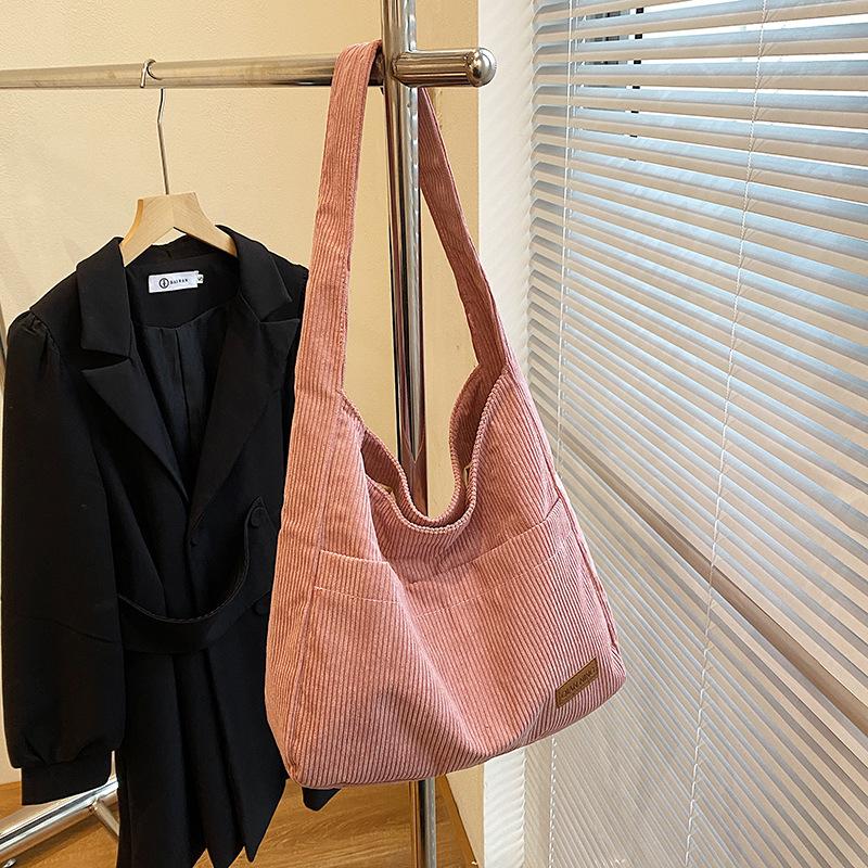 

Popular large-capacity tote bag women s 2025 autumn and winter new trendy fashion and casual versatile shoulder bag underarm bag розовый