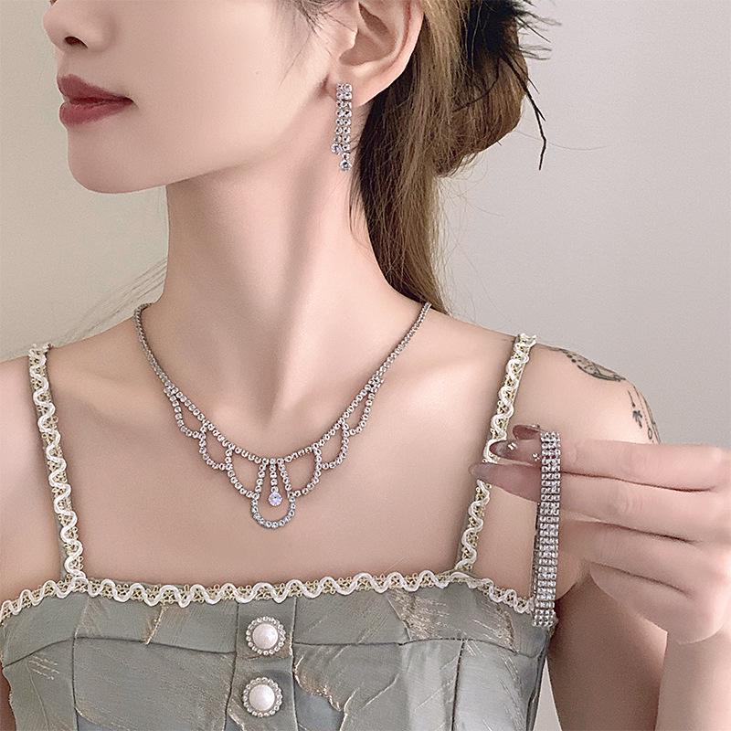 2024 Summer Women's Zircon Collarbone Necklace and Light Luxury Earrings with Bracelet – Trendy High-End Accessories.