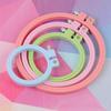 Assorted Plastic Embroidery Hoops: Adjustable Sizes for Cross Stitch, Punch Needle, and DIY Projects.