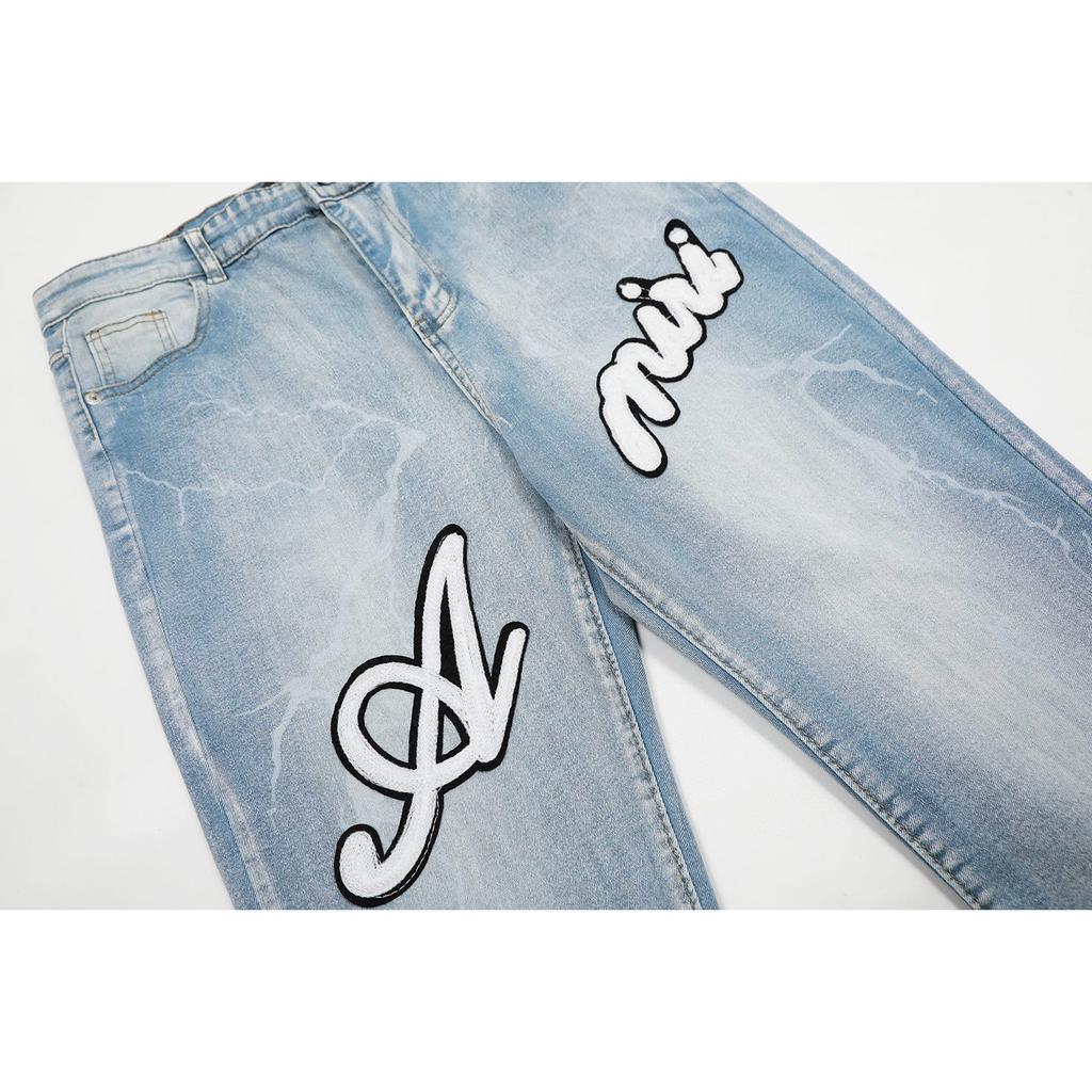 M09 Amiri Herren- und Damen-Jeans im amerikanischen Stil mit Stoffflicken, Löchern, Stickereien, lässige und modische High-Street-Hosen