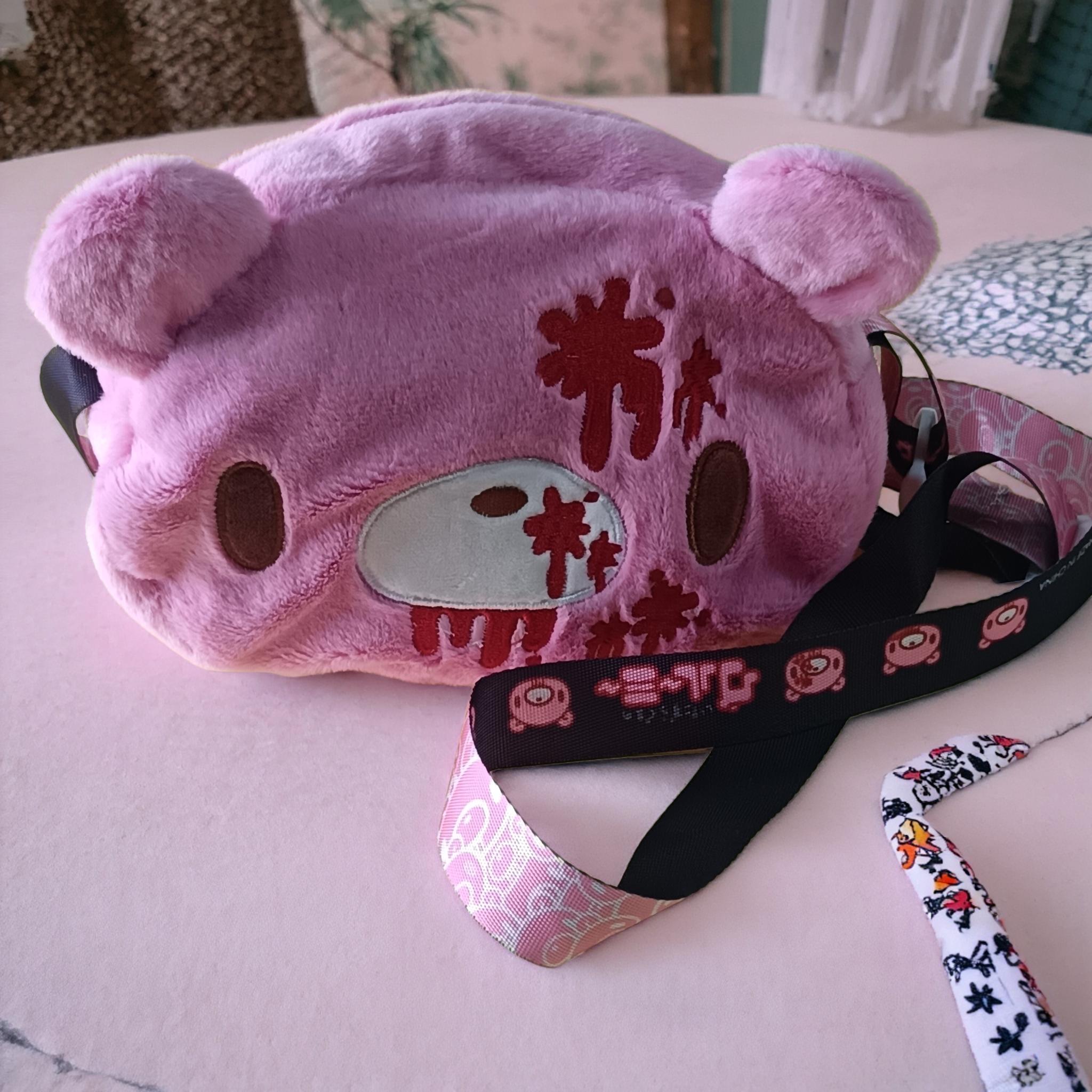 

Gloomy Bear plush crossbody bag: Pink, cute - edgy with “blood - splatter” details. A fun, unique pick for fans.