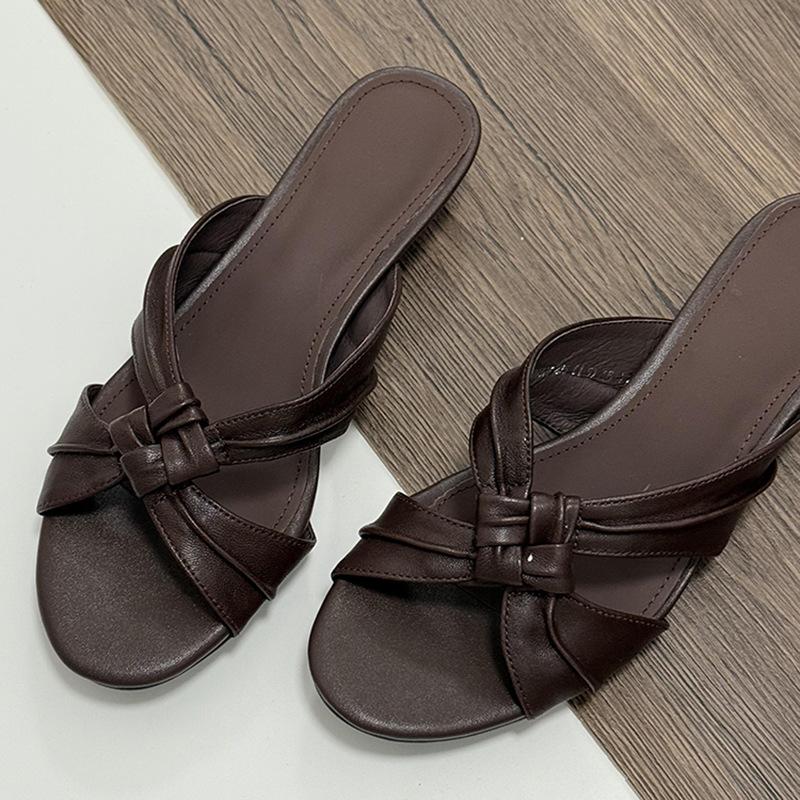 Cowhide version! Temperament commuter wedge heel one-word cool slippers women's new kinked open-toed half slippers