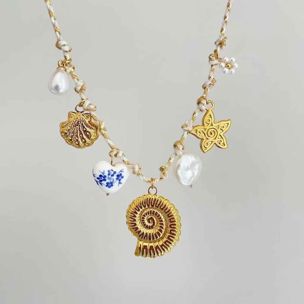 Conjunto de Pulsera y Collar Estilo Océano con Conchas y Estrellas Marinas de Acero Inoxidable