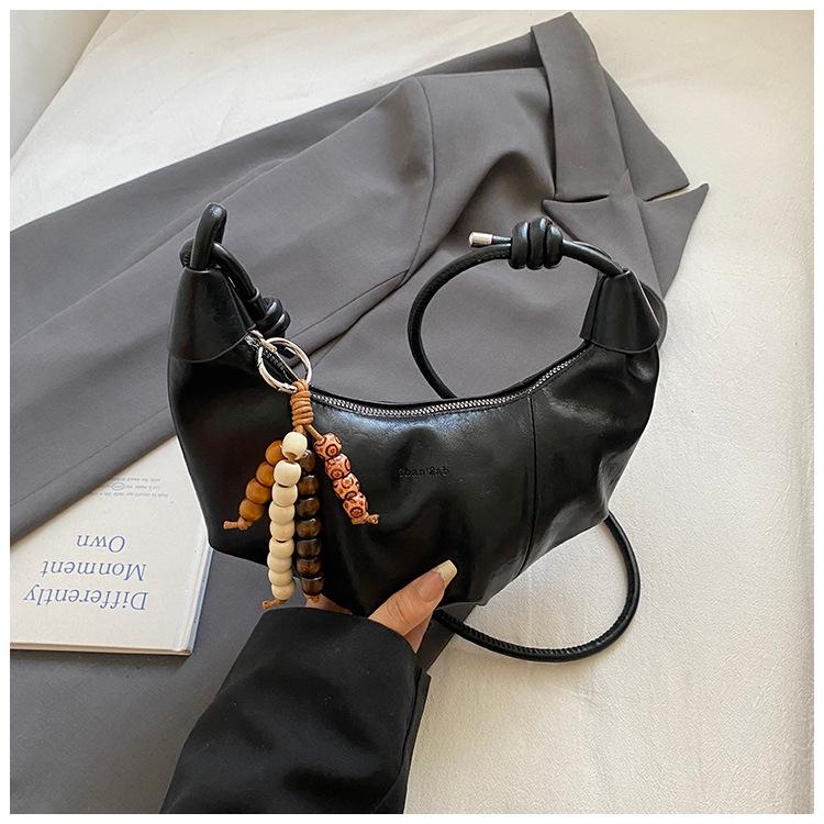 

Маленькая сумка высокой стоимости женская 2025 новая модная одноплечевая подмышечная сумка-пельмень модный нишевый мессенджер круассан чёрный