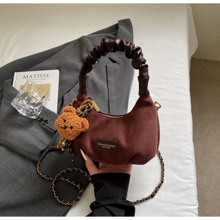 

Premium sense super fire niche bag 2025 new retro versatile shoulder messenger bag fashion portable dumpling bag tide темно-коричневого
