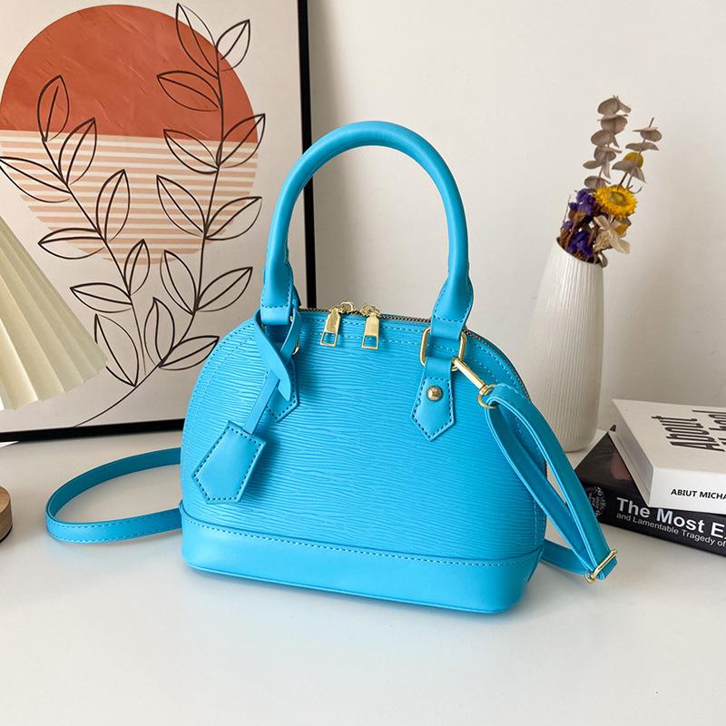 High-value niche design women's bags, fashionable and popular women's shell bags, large-capacity Korean shoulder messenger bags.