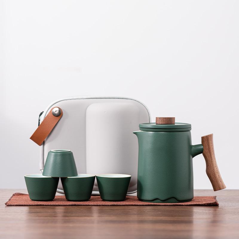 

Travel tea set Kuaike cup one pot four cups teapot Guochao portable outdoor high-end ceramic wooden handle