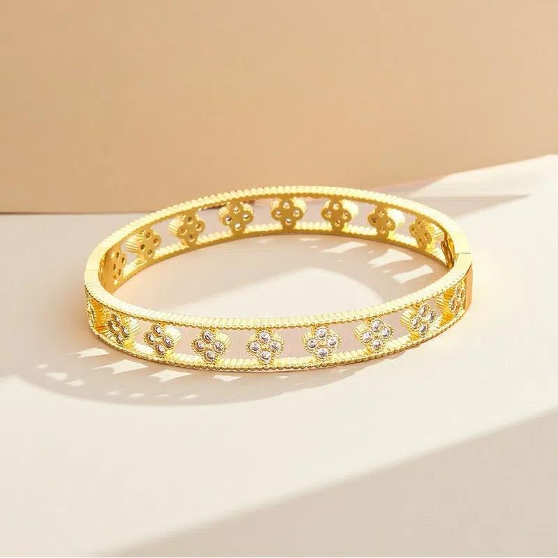 2026 Vierblättriges Kleeblatt Armband Damen Hohl Design High-End Blumenarmband Voll mit Diamanten Kaleidoskop Armband Vielseitiger Schmuck