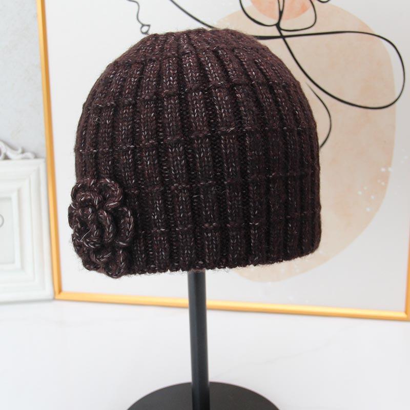 Three-dimensional flower knitted headgear women's autumn and winter face small warm windproof cold hat ear protector wool hat pullover hat