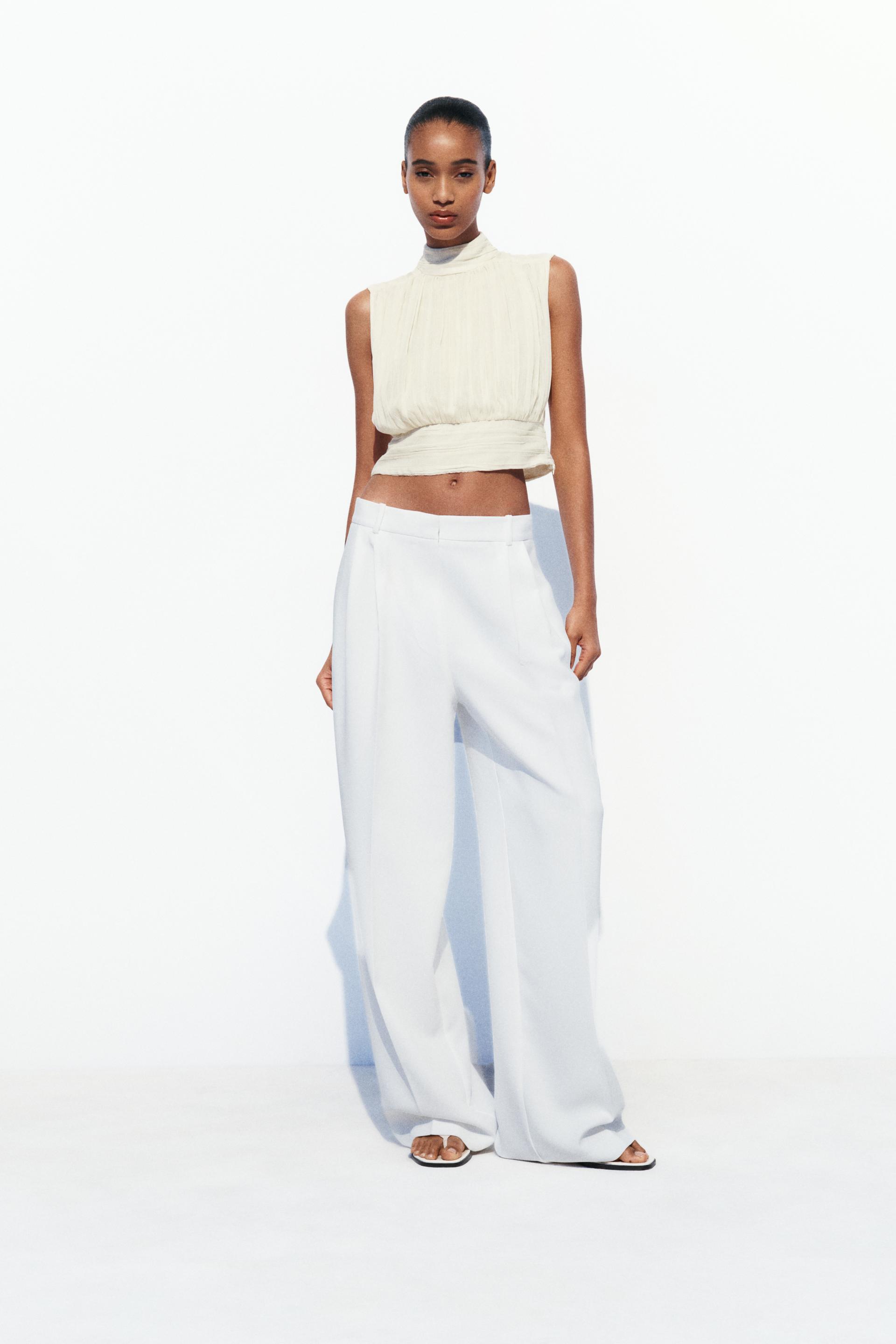 

УКОРОЧЕННЫЙ ТОП С СКРЫТЫМ ЭФФЕКТОМ