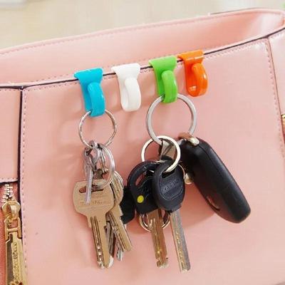 4 STÜCKE Kreative Anti-Taschenhaken Geladen im eingebauten Schlüsselhalter Schlüsselclip Leicht zu tragen