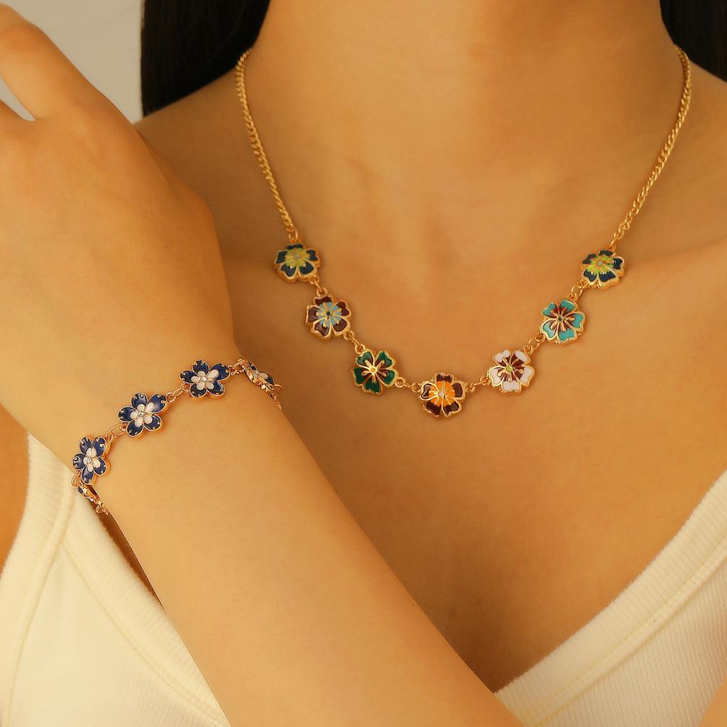 Retro oil dripping flower women's bracelet women's light luxury versatile high-end sense niche design sense color flower pendant jewelry