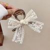 Elegant Pearl Bow Hair Clip for Women - 2024 High-End Shark Style