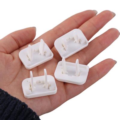 50pcs Solid Color Anti-electric Shock Protection Cover Two Holes Design Safety Lock Electrical Safety Plug Guard ABS