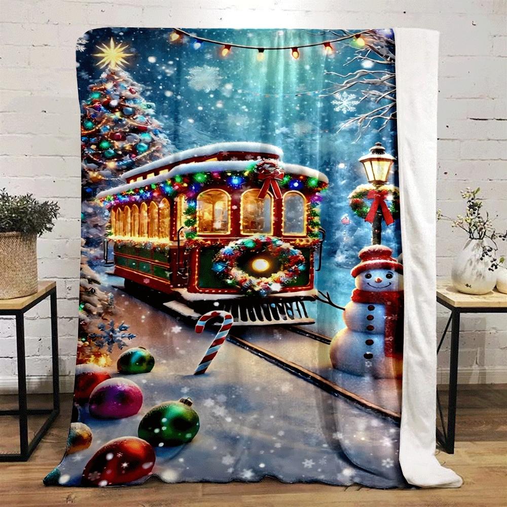 Trem festivo com luzes coloridas cercado por decoração coberta de neve. cobertor para todas as estações manta para pausa para almoço presente