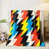 Zigzag lightning shapes in bold colors, including red, yellow, blue, and black. for all seasons blanket lunch break throw gift