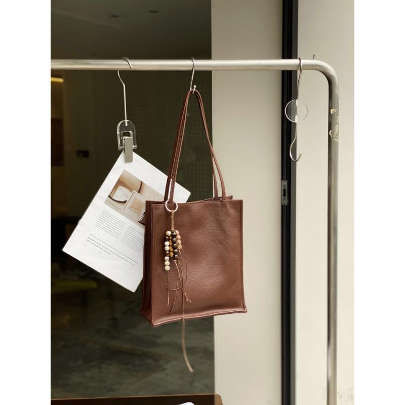 Top layer cowhide simple and versatile tote bag 2025 new commuter leather women's bag large capacity single-shoulder armpit bag