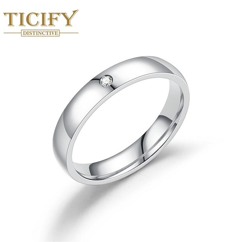 Lichtbeständiger Paarring aus Titanstahl mit eingelegtem Diamant und heller Oberfläche aus Edelstahl