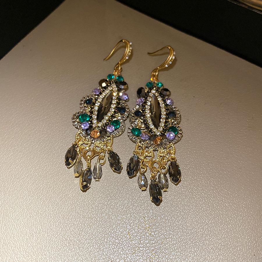 

Ethnic style diamond-set water drop fringed earrings retro fashion unique temperament ear hook light luxury high-end earrings