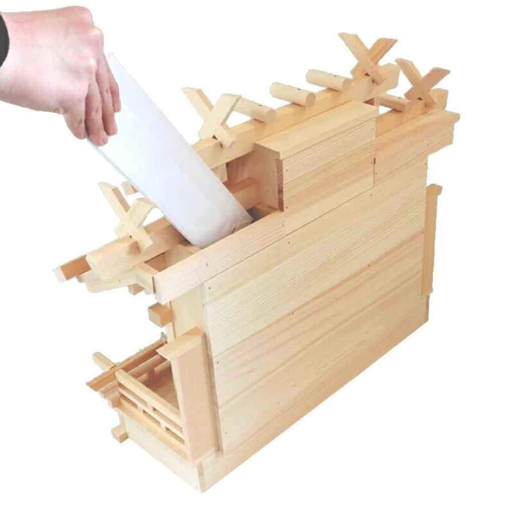 A complete set of three small Kiso Hinoki cypress shrines with different roofs from Kamidana no Sato.