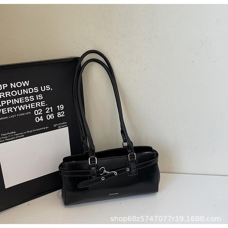 

Niche texture baguette bag underarm bag women s 2025 new trendy high-end commuter portable pillow bag shoulder bag чорний