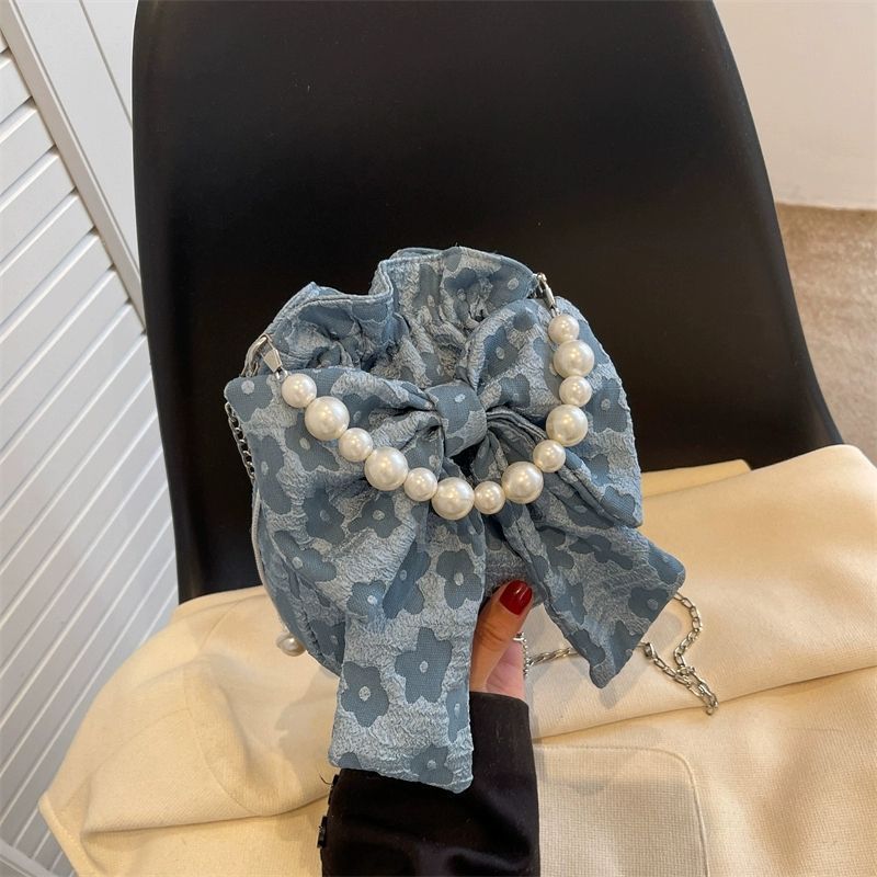 

This year s popular niche bag women s new trendy summer versatile cute bow pearl portable messenger bag синий