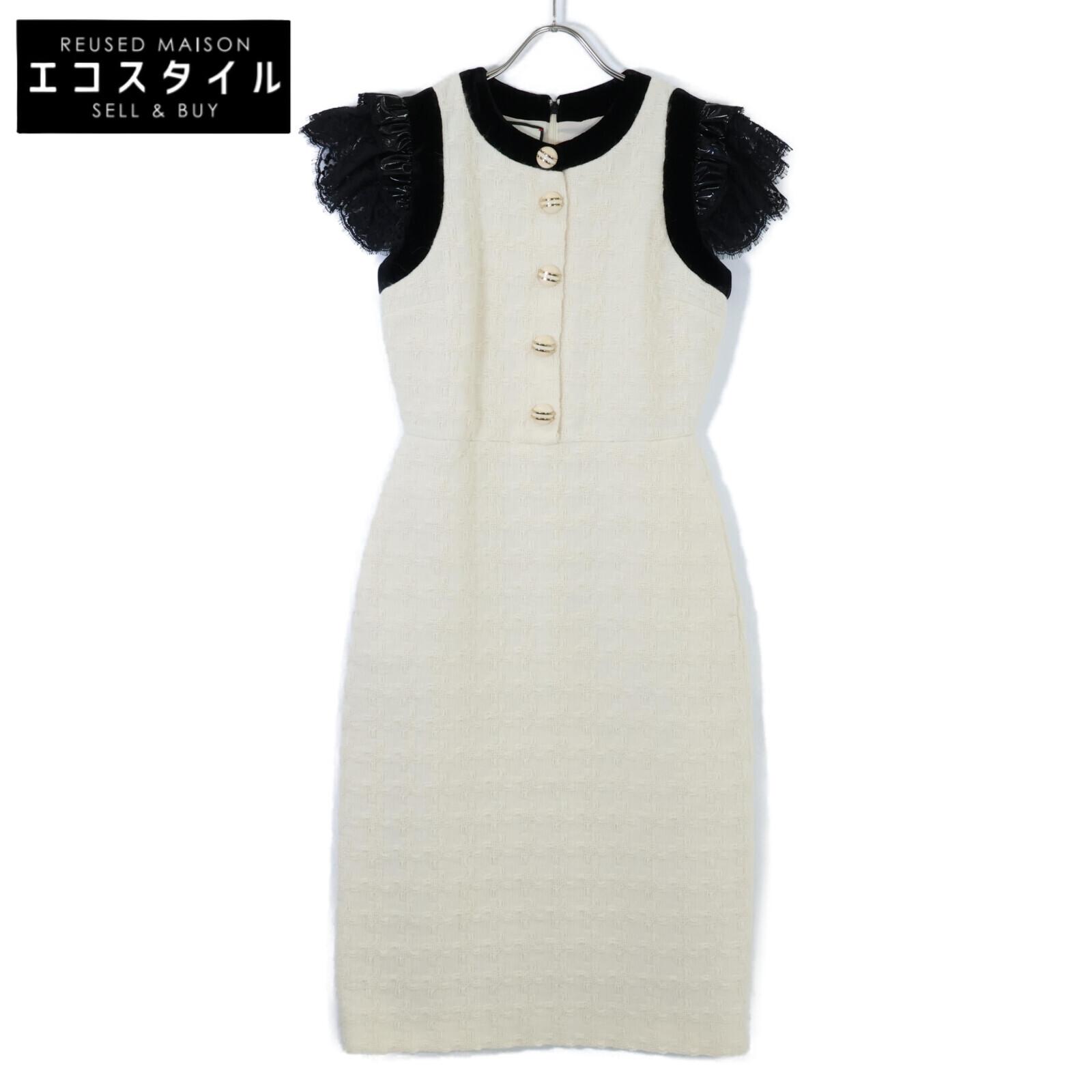 

Gucci [/Внутренний обычный] 595331 ZACKV двухцветное трикотажное платье с оборками на манжетах 36 Слоновая костьx черный Б/у