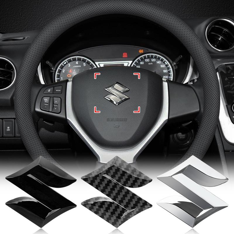 4,9*5cm ABS Auto Lenkrad Mittel Emblem Aufkleber Zubehör für Suzuki Samurai Ltz 400 Vitara Gsr 600 Jimny Escudo Swift Strom 650 Alto