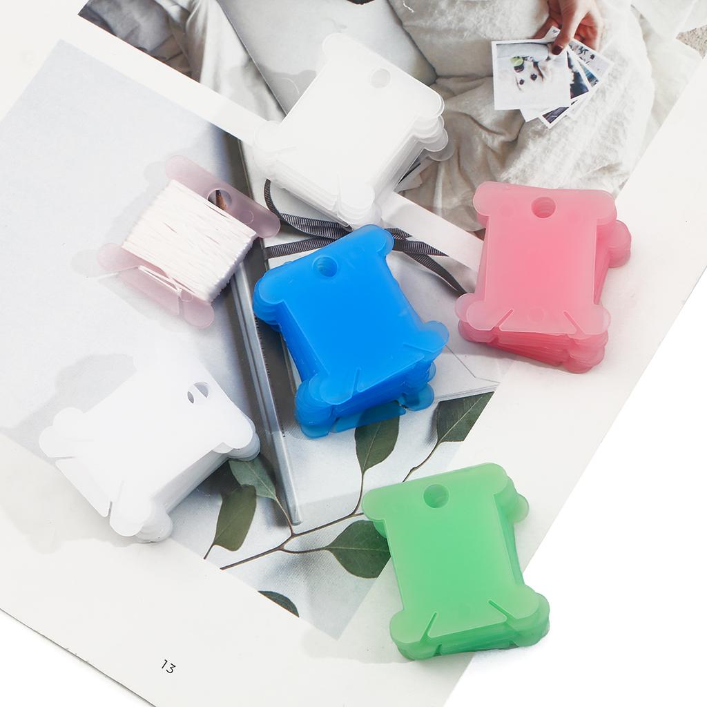 20/50 sztuk Uchwyt na nici Narzędzie do nawijania szpulki Uchwyt do przechowywania szpulki Plastikowa tablica na nici do szycia Karta Organizer nici do majsterkowania