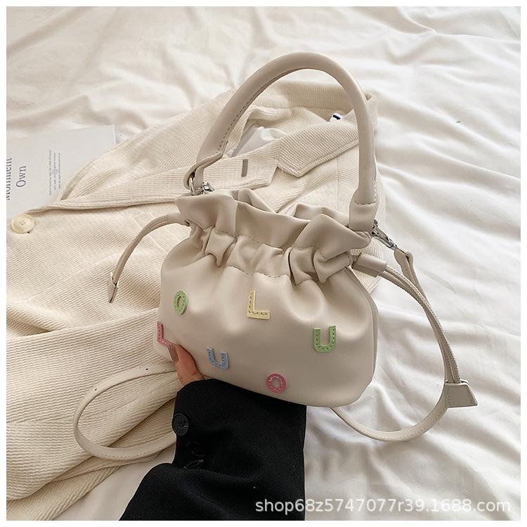 

Spring and summer niche commuting fashion temperament portable bucket bag women s 2025 new crossbody one-shoulder hand-held bag