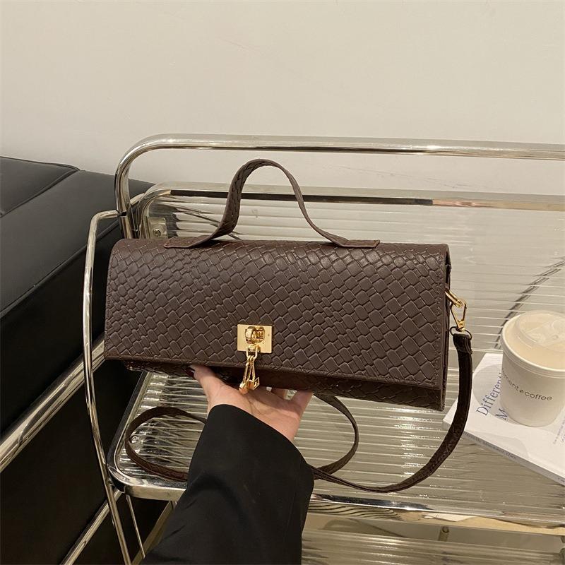 Frühling und Sommer neue strukturierte gewebte Muster Mode Handtasche personalisierte Schultertasche Umhängetasche minimalistischer Stil kleine quadratische Tasche
