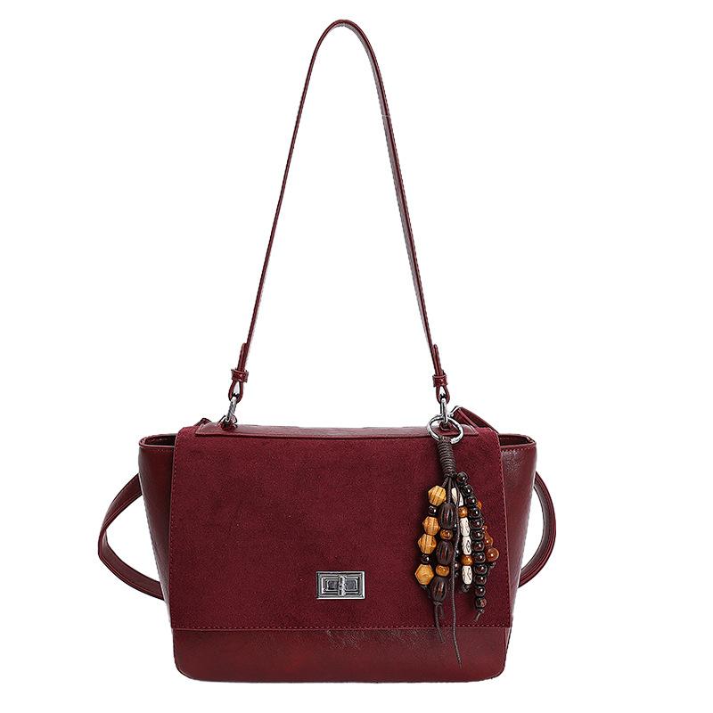 

Vintage suede 2025 new versatile niche splicing trend pendant tote bag shoulder bag women s messenger bag
