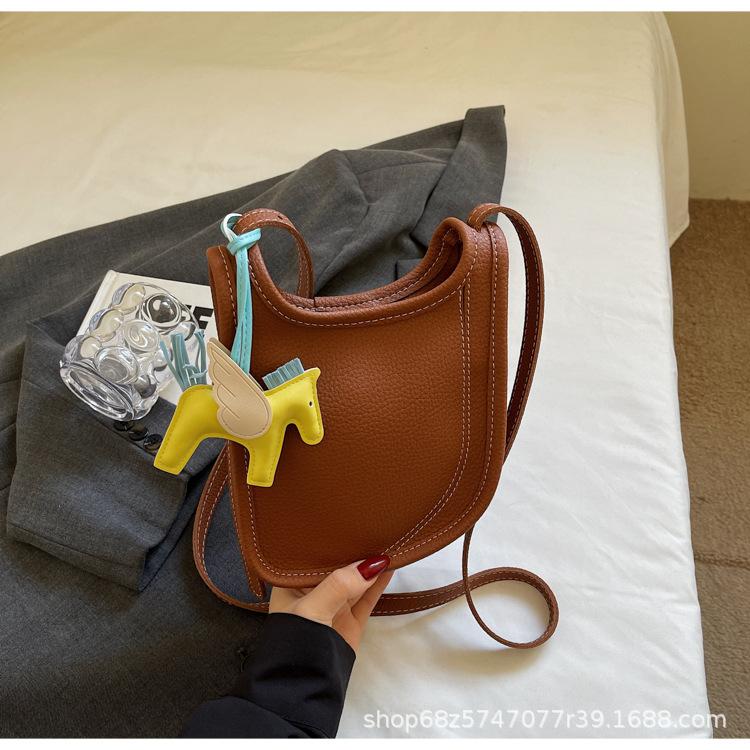 

Korean trendy bucket bag women s 2025 spring/summer new high-end fashion shoulder bag niche temperament women s bag коричневый
