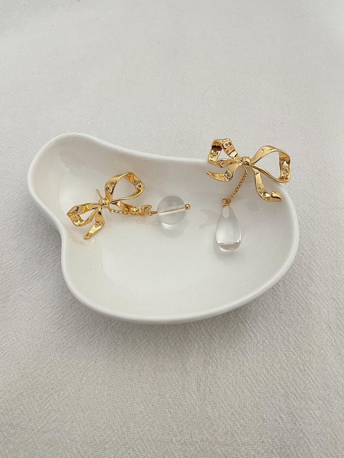 

Light luxury high-end water drop pendant earrings women s niche versatile sweet girl style bow earrings new copper