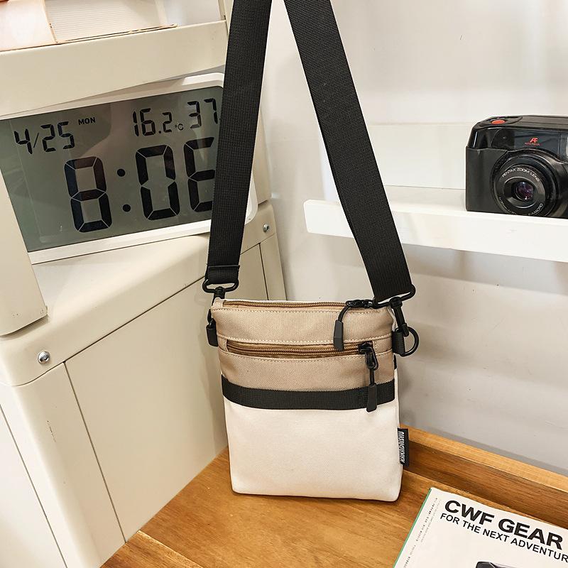 Japan and South Korea fashion new simple literary and artistic fan shoulder messenger bag 2025 commuter sports niche leisure small square bag