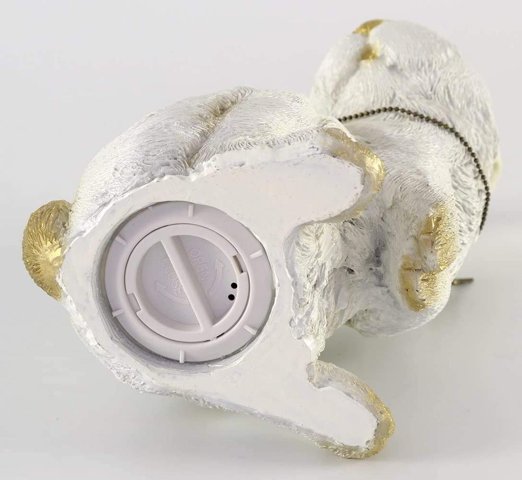 A round shape piggy bank x 10 x cm realistic the gaze of the rabbit gazing at the keys hanging from it is interior Enver Hellook cute, object, rabbit,