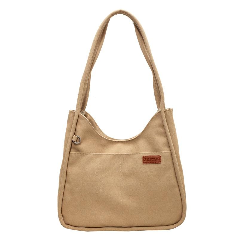 Simple niche canvas bag, new large-capacity women's retro shoulder bag, textured commuter shoulder underarm bag for women