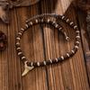 IngeSight.Z Collana girocollo con perline in guscio di cocco vintage per uomo Punk Creativo Ciondolo dente Collana Fascino per feste Gioielli 2026