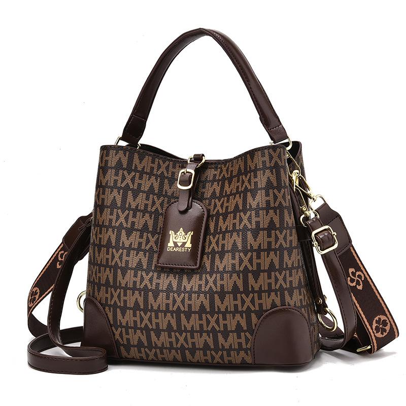 Bolsas Bolsas mensageiro femininas 2025 Novas bolsas da moda de grande capacidade Bolsas balde de ombro versáteis populares Bolsas femininas maré