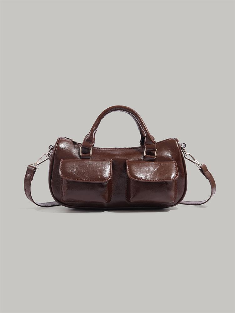 

Large capacity bowling bag 2025 new spring and summer handbag high sense daily casual versatile single shoulder oblique span bag коричневый