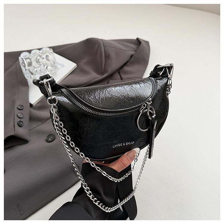 

Нишевая дизайнерская сумка женская 2025 лето новая модная на плечо сумка-мессенджер в этом году популярная сумка-пельмень на цепочке чёрный