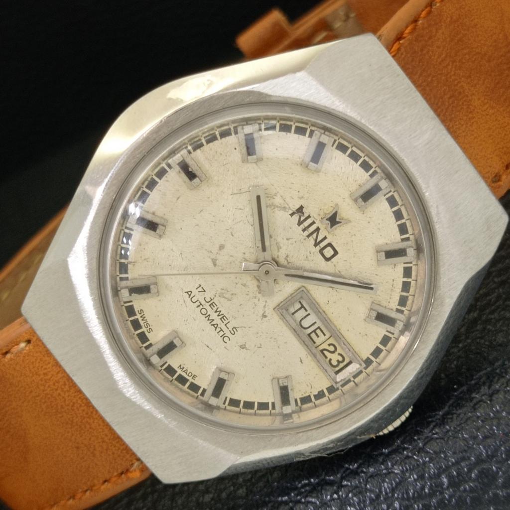 

ВИНТАЖНЫЕ МУЖСКИЕ АВТОМАТИЧЕСКИЕ ШВЕЙЦАРСКИЕ ЧАСЫ NINO С ОРИГИНАЛЬНЫМ ЦИФЕРБЛАТОМ a700142-5 R201-a700142