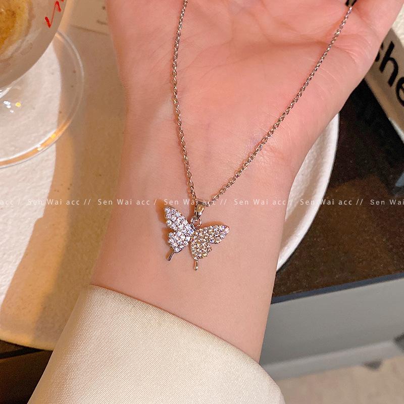 Micro-inlaid zircon butterfly pendant necklace women s light luxury design titanium steel clavicle chain Korean accessories