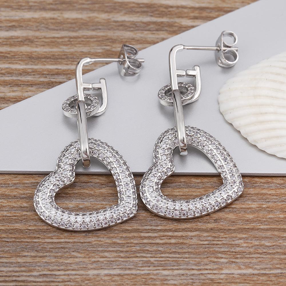 

Nidin New Design Heart Shape Hollow Crystal Cubic Zirconia Drop Earrings Women s Charm Fashion Jewelry Wedding Romantic Gift срібний