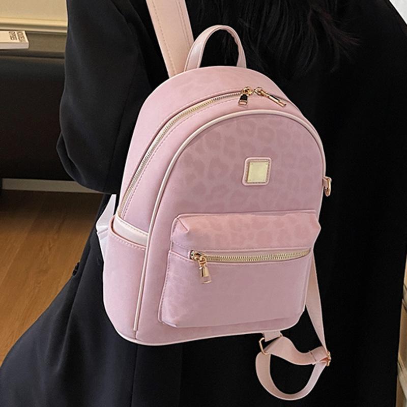 Autumn new simple backpack women's large capacity niche leopard print casual backpack travel backpack