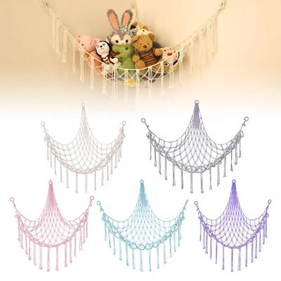 Toy Hammock Is Hung In the Corner and Is Equipped with a Storage Net, a Toy Storage Bag, and a Wall-mounted Hammock.