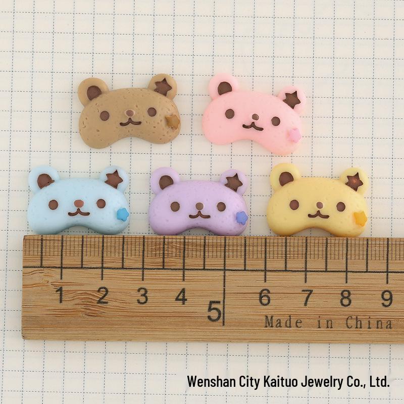 Cartoon Bear Eye Mask Series: DIY Phone Case, Hair Clip, Water Bottle Pendant, and Crocs Resin Accessories.